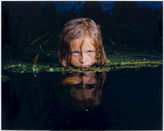Oleg Kulik, from the series Alice vs. Lolita, 1999-2000, color photo, mounted on dibond. Collection of Stella Art Foundation